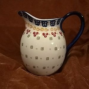 Pretty, painted pitcher. About 7 inches tall.